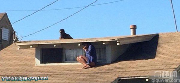 惊险：实拍屋顶女子和找她的劫匪(组图)